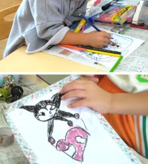 オリジナル下敷きのための絵を描く子供たち